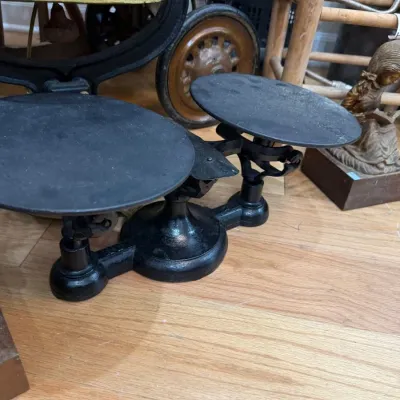 Antique cast iron balance scale with two pans