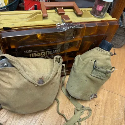 Canvas canteens with shoulder straps and wooden tool box