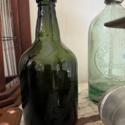 Antique olive green glass bottle