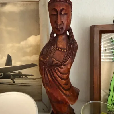 Carved wood Guan Yin figure