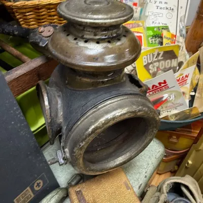 Antique brass and iron carriage lamp with fishing lure cards