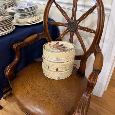 Antique wheel back armchair with leather seat