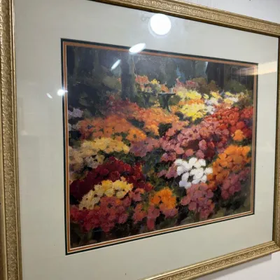 Framed floral garden painting in gilt frame