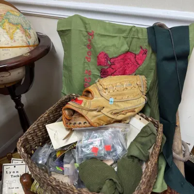 Basket lot with Rawlings baseball glove and Boy Scout troop flag