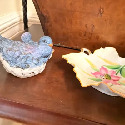 Ceramic bluebird figurine and painted leaf dish