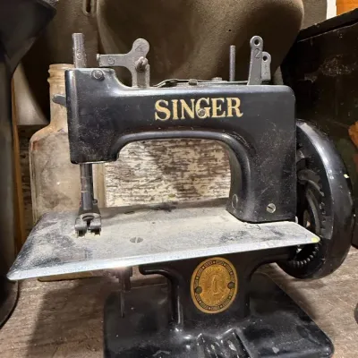 Antique Singer toy sewing machine