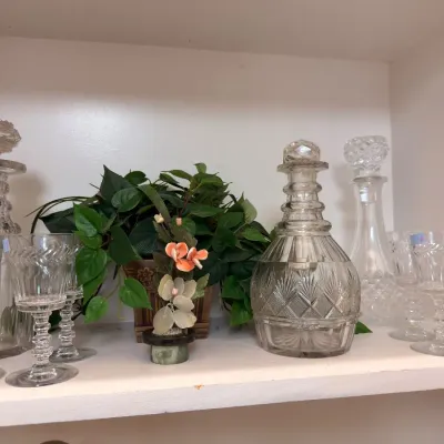 Cut glass decanters with cordial glasses