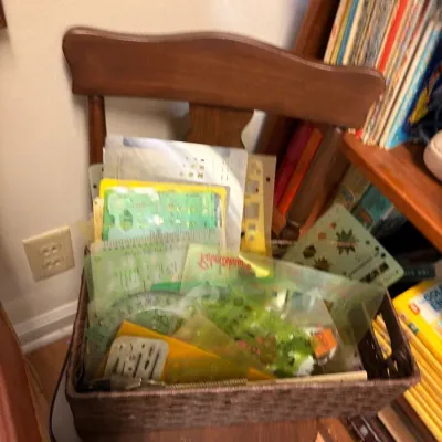 Basket of drafting templates and craft stencils