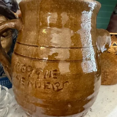 Antique salt glaze stoneware pitcher with incised lettering