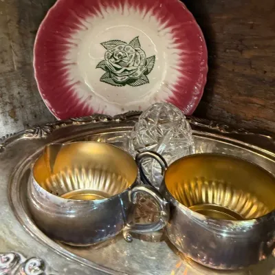 Silver plate creamer and sugar on footed tray