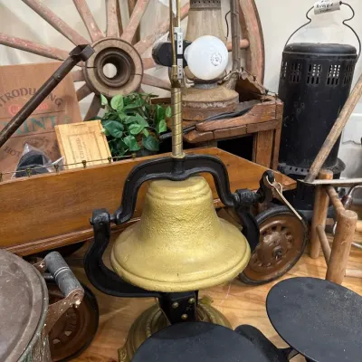 Cast iron mounted farm bell, gold painted
