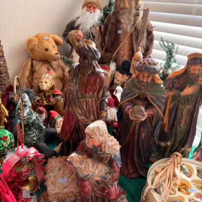 Large nativity figures with Santa figures and teddy bear