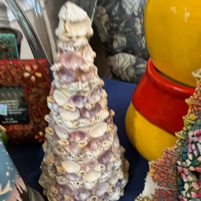 Seashell encrusted decorative cone tree