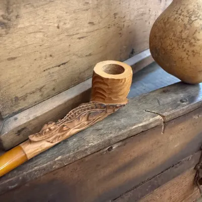 Hand carved dragon figural smoking pipe
