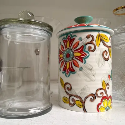 Glass and floral ceramic kitchen canisters