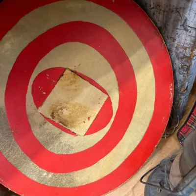 Vintage painted wood bullseye target board