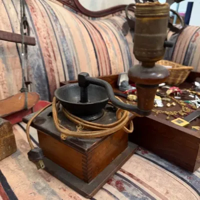 Antique wooden box coffee grinder with cast iron crank