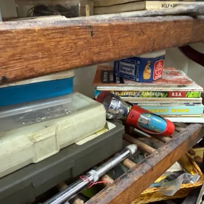 Boy Scout handbooks, Uneeda Biscuit tin and tackle boxes