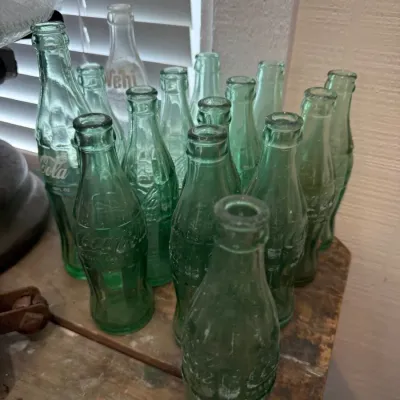 Collection of vintage Coca-Cola glass bottles