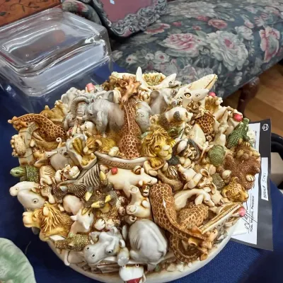 Signed sculpted animal menagerie bowl with certificate