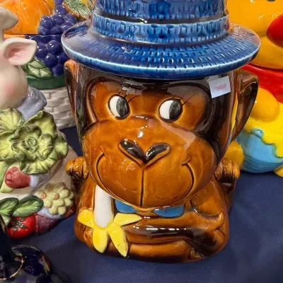 Vintage monkey in blue hat cookie jar
