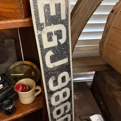 Vintage embossed metal license plate
