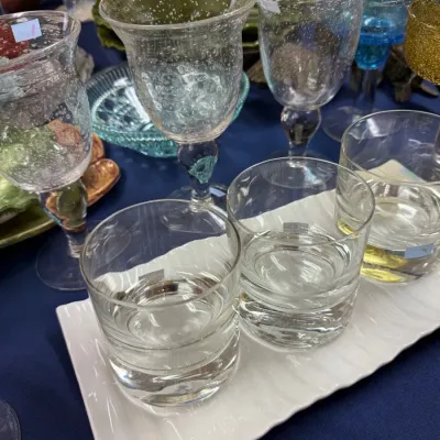Bubble glass goblets and silver band rocks glasses
