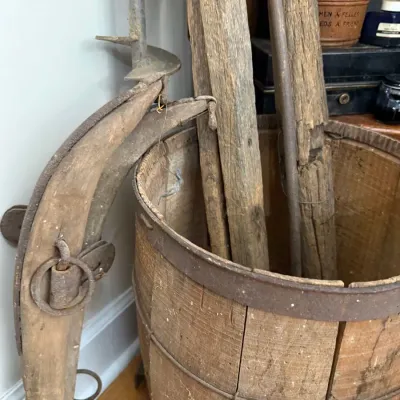 Primitive staved wooden bucket with iron bands