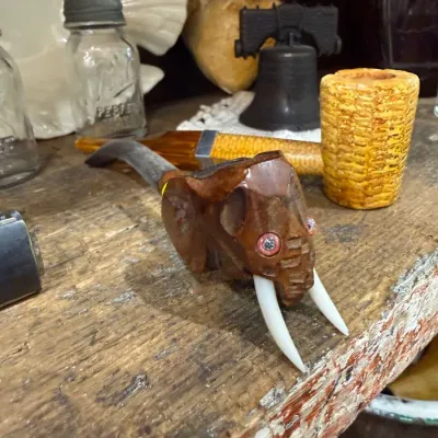 Carved elephant head pipe bowl with tusks