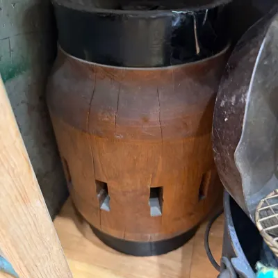 Antique wooden barrel form with metal bands