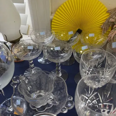 Etched crystal champagne coupes and cut crystal goblets