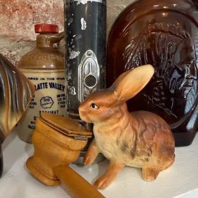 Vintage ceramic rabbit figurine with wooden gavel