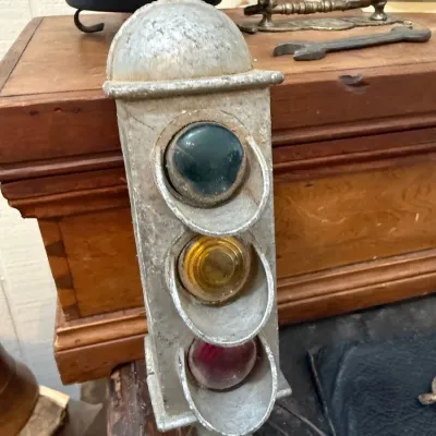 Vintage metal traffic light with colored lenses
