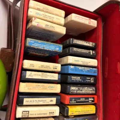 Case of vintage 8-track tapes with Eagles and Johnny Cash
