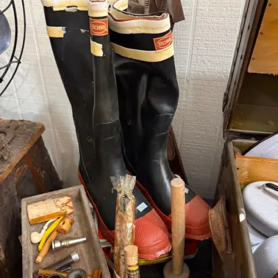 Boss rubber work boots with drawer of estate pipes