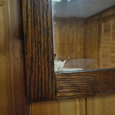 Wavy-Front Wooden Chest-of-Drawers and Wood-Framed Wall Mirror