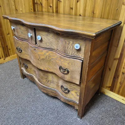 Wavy-Front Wooden Chest-of-Drawers and Wood-Framed Wall Mirror
