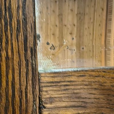 Wavy-Front Wooden Chest-of-Drawers and Wood-Framed Wall Mirror