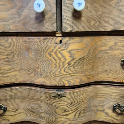 Wavy-Front Wooden Chest-of-Drawers and Wood-Framed Wall Mirror