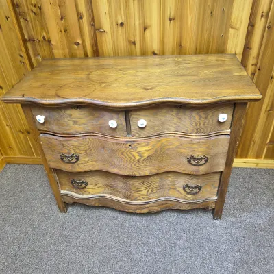 Wavy-Front Wooden Chest-of-Drawers and Wood-Framed Wall Mirror