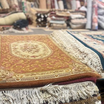 Sale Photo Thumbnail #5: Warm gold traditional rug with an elegant center medallion.