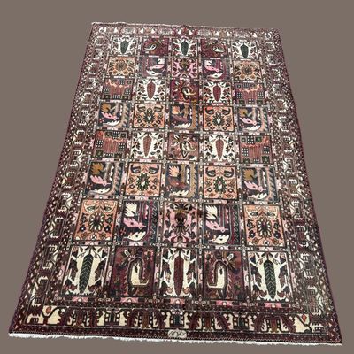 Sale Photo Thumbnail #143:     Unique geometric rug featuring intricate motifs in rich, deep colors.