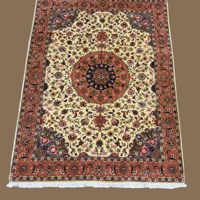 Sale Photo Thumbnail #24: Classic medallion rug with a warm ivory field and detailed border.