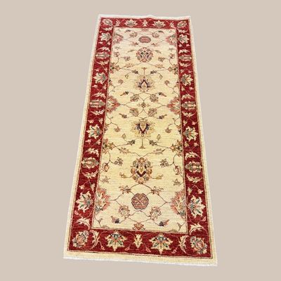 Sale Photo Thumbnail #144:     Elegant ivory runner with delicate floral motifs and a rich red border.