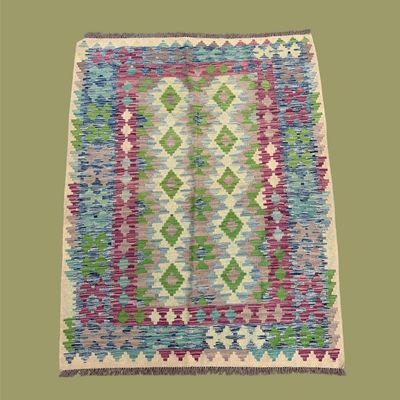 Sale Photo Thumbnail #56: Colorful geometric rug with soft green, pink, blue, and purple tones.
