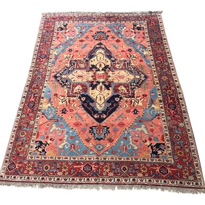 Sale Photo Thumbnail #141:     Vibrant traditional rug with an ornate medallion and detailed floral border.