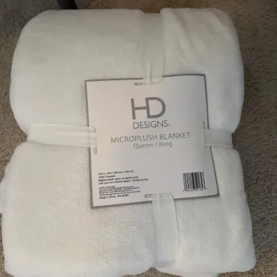 Sale Photo Thumbnail #38: HD Designs white microplush blanket, sized Queen/King, in new condition with original packaging ribbon and label.