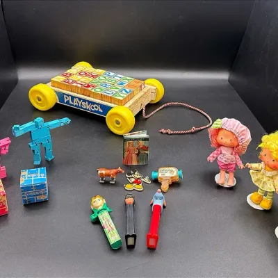 Vintage Toys And Dolls Featuring A Set Of Strawberry Shortcake Dolls & A Playschool Block Pull Wagon