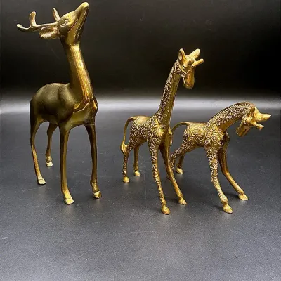 Vintage Brass Reindeer And A Pair Of Brass Giraffe Decorative Figuines