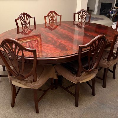 Sale Photo Thumbnail #26: Oval dining table converts to round with removal of center leaf, table & leaf protector included 